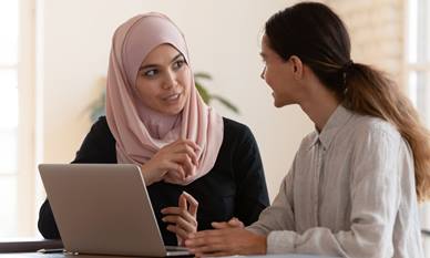 Female financial adviser with client