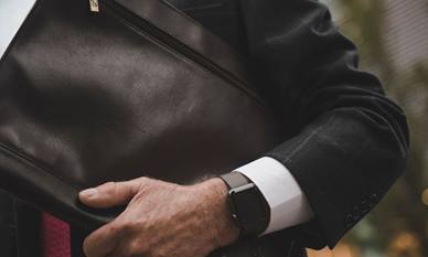 Man holding black briefcase