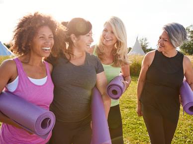 Group of women with yoga mats