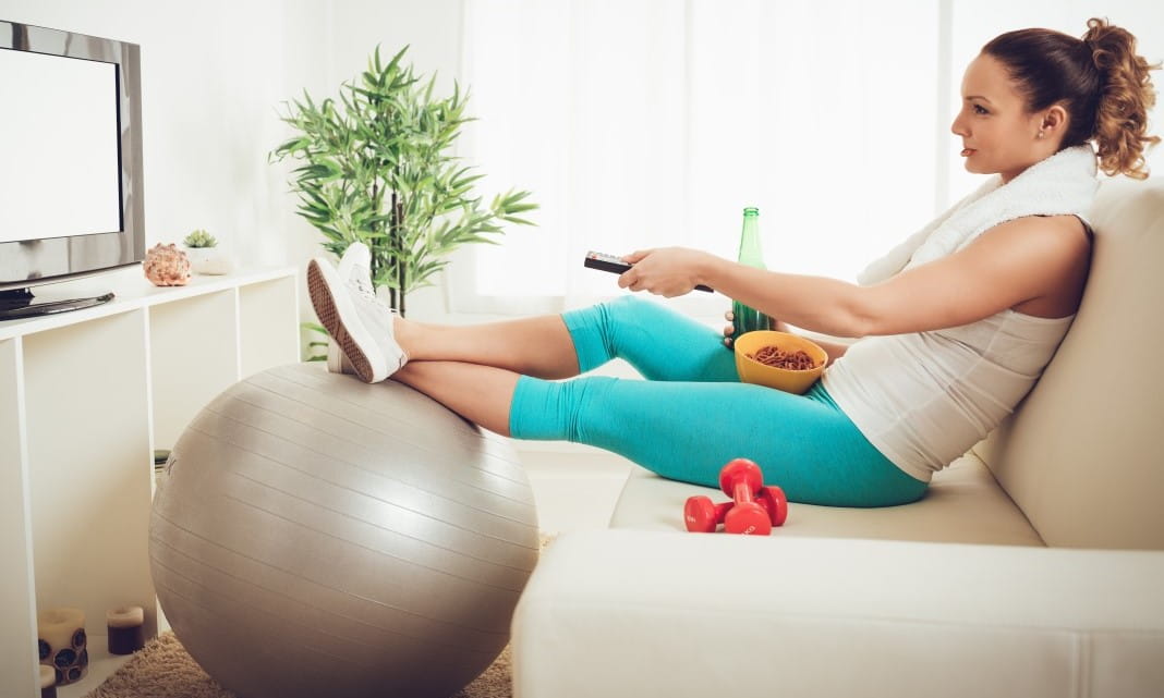Woman sat watching tv