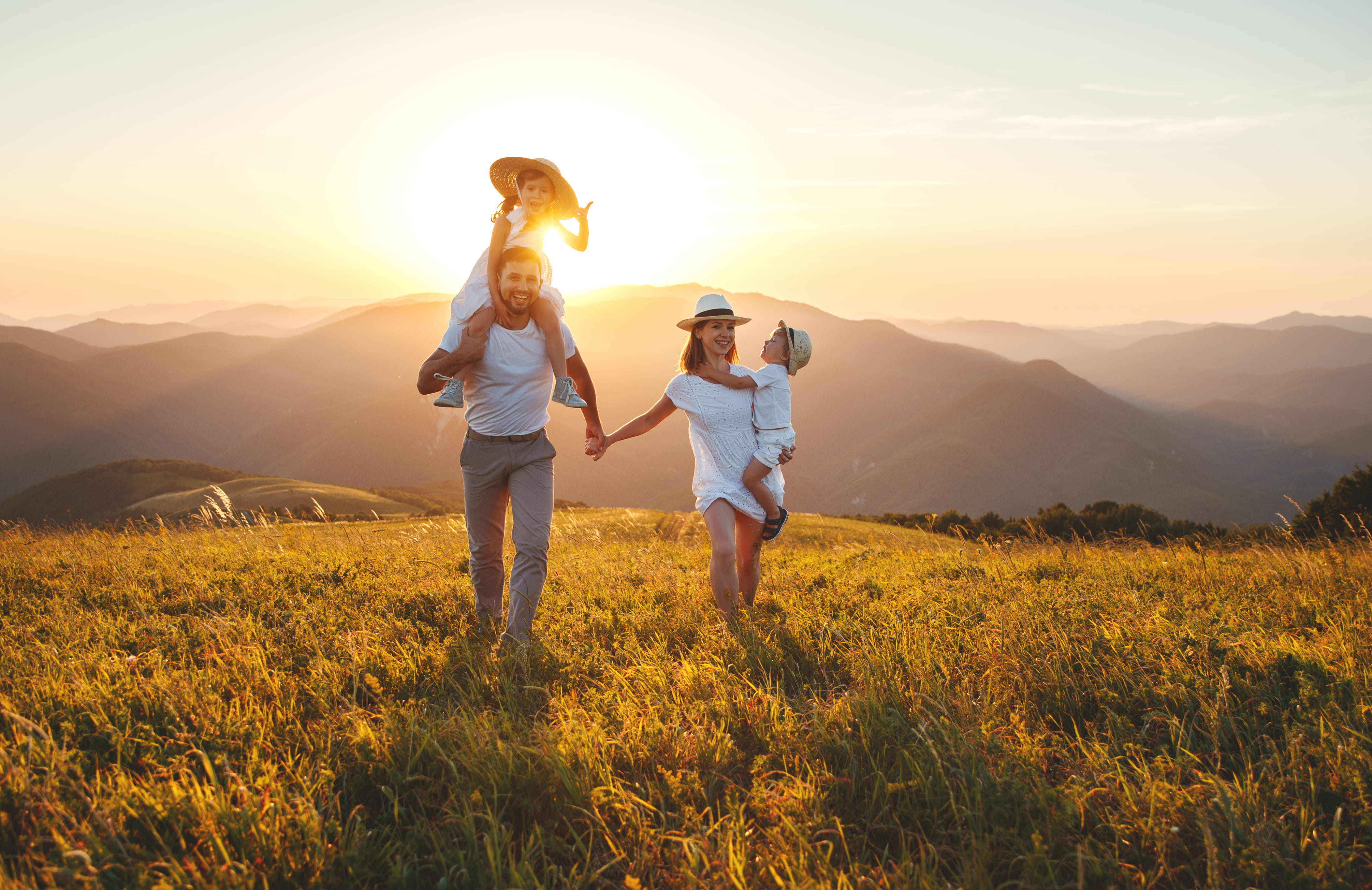 family walking in field