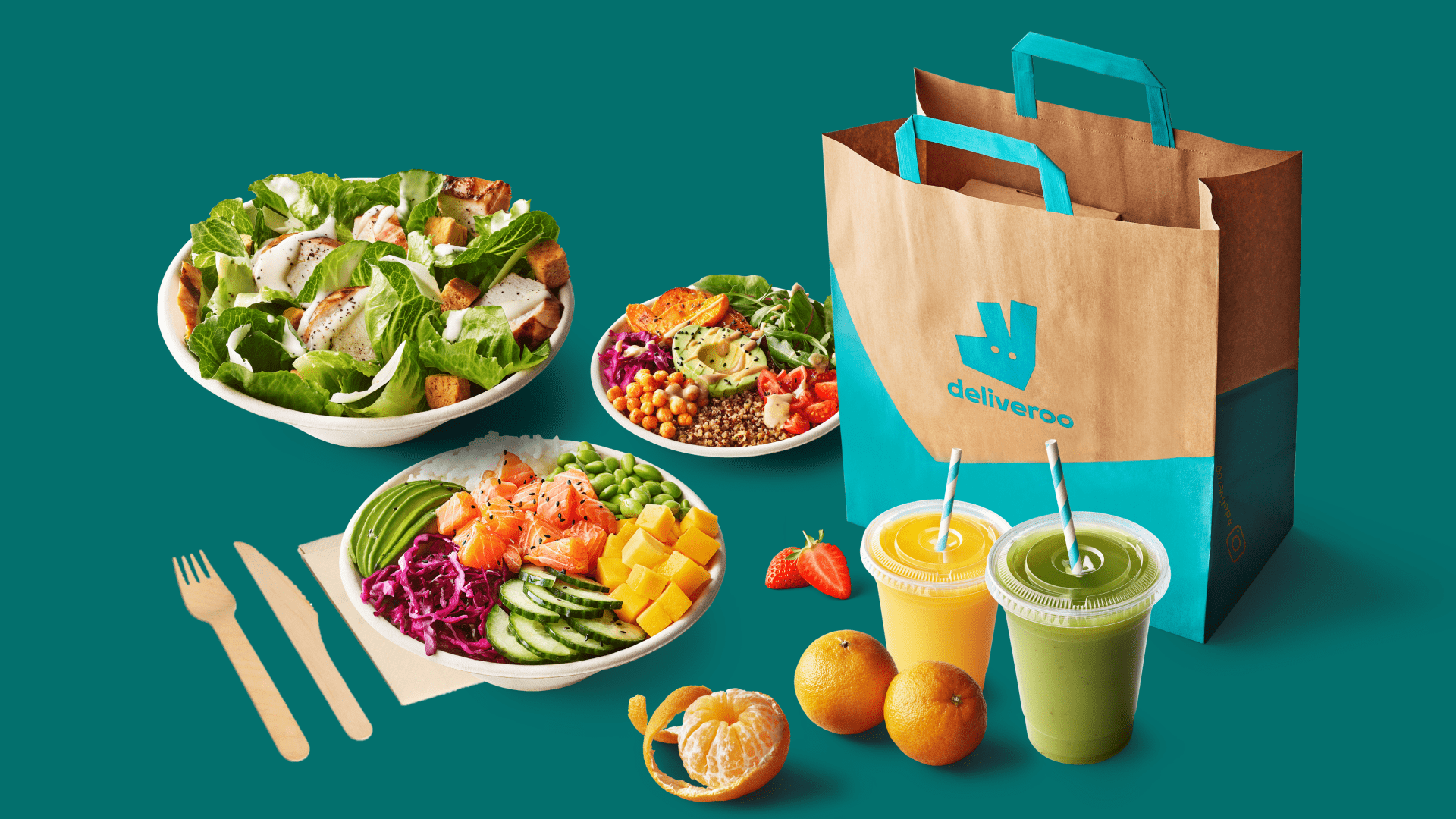 Deliveroo bag with selection of food like salads and smoothies