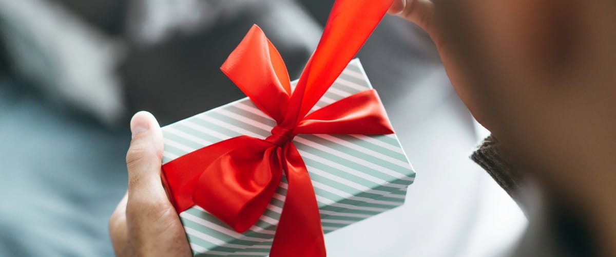 person-opening-a-present