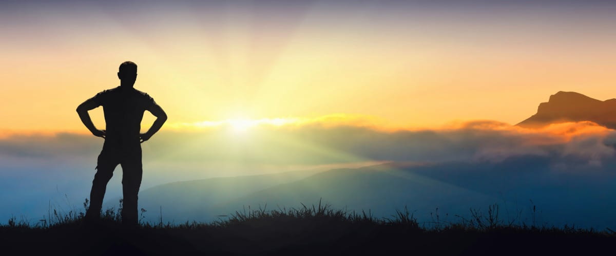 sun-rise-man-silhouette-mountain